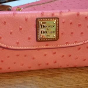Dooney and Burke clutch purse pink Ostrich collection.